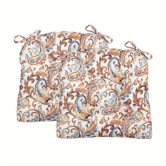 Paisley Set of 2 Chair Cushions - Spice Add a splash of style to your seating with our Paisley Set of 2 Chair Cushions in a vibrant spice color. These updated medallion print cushions are both fun and practical, perfect for enhancing the look and comfort