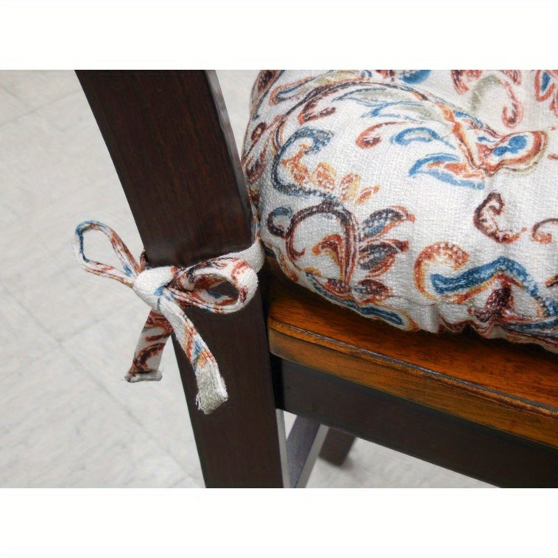 Paisley Set of 2 Chair Cushions - Spice Add a splash of style to your seating with our Paisley Set of 2 Chair Cushions in a vibrant spice color. These updated medallion print cushions are both fun and practical, perfect for enhancing the look and comfort